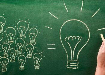 light bulbs sketched on chalkboard Many small ideas make a big one