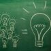 light bulbs sketched on chalkboard Many small ideas make a big one